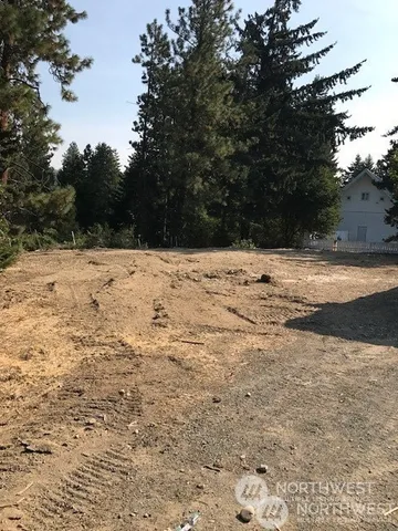 a view of a lake from a balcony