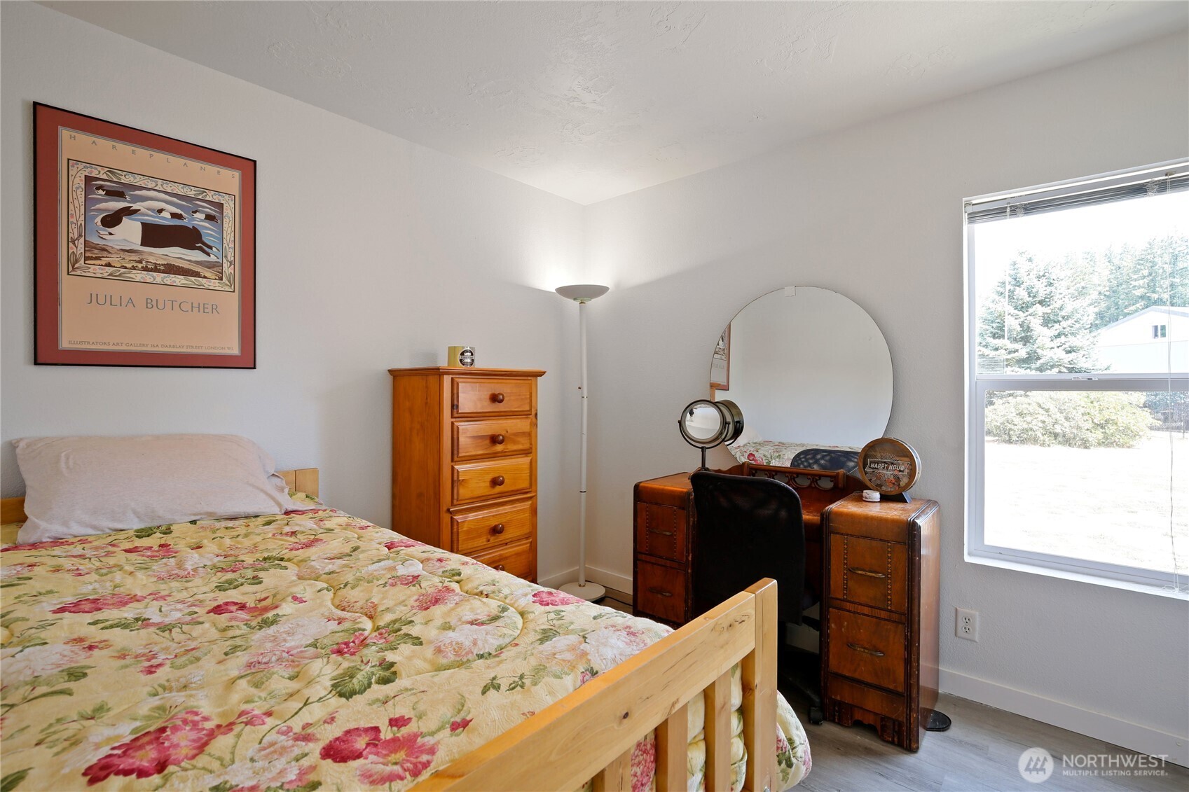 270 Romerman Road, Unit 34 Chehalis, WA 98532 - Photo 16 of 34 a bedroom with a bed and a dresser with mirror