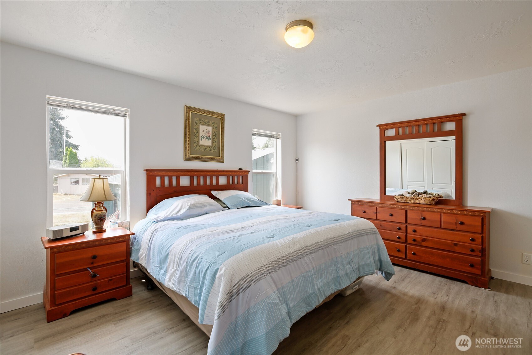 270 Romerman Road, Unit 34 Chehalis, WA 98532 - Photo 18 of 34 a bedroom with a bed and a dresser