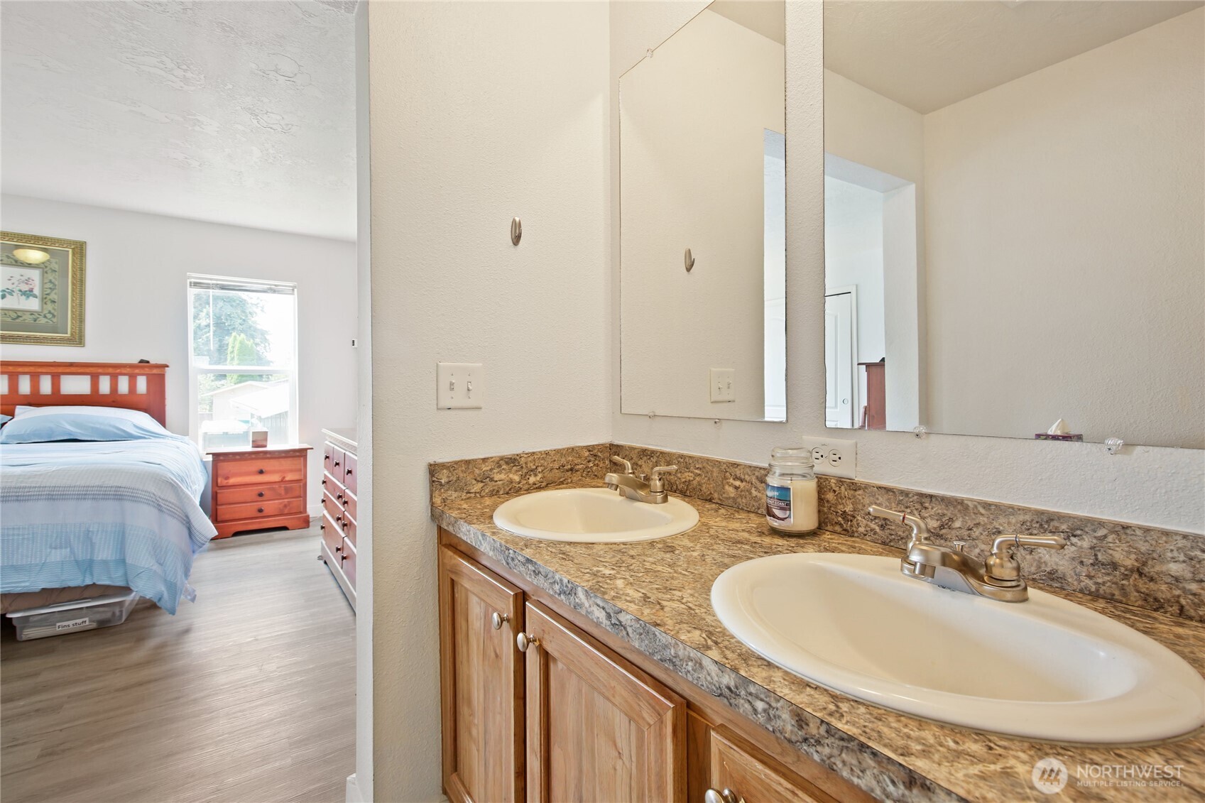 270 Romerman Road, Unit 34 Chehalis, WA 98532 - Photo 22 of 34 a bathroom with a granite countertop sink and a mirror