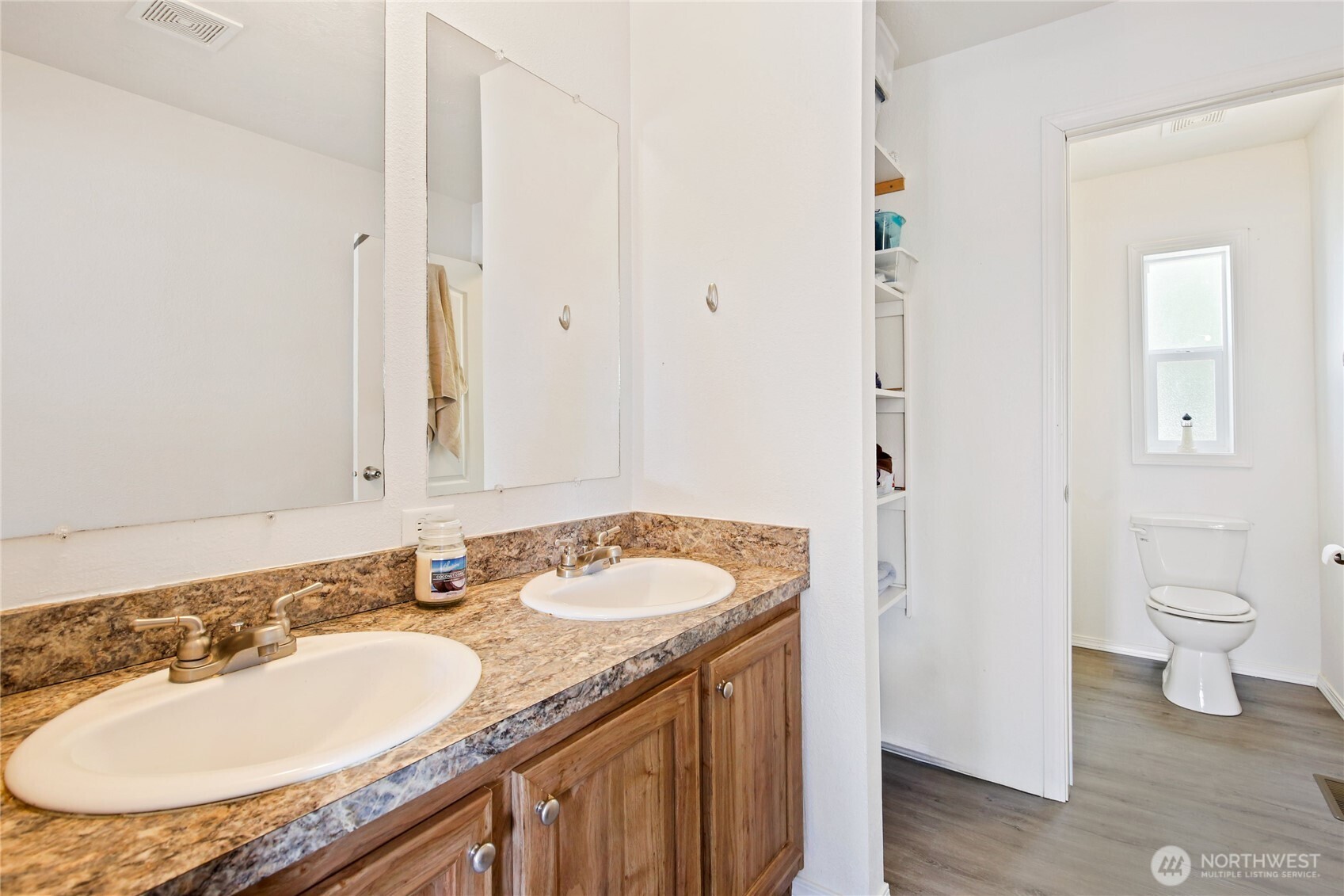 270 Romerman Road, Unit 34 Chehalis, WA 98532 - Photo 24 of 34 a bathroom with a granite countertop sink and a mirror