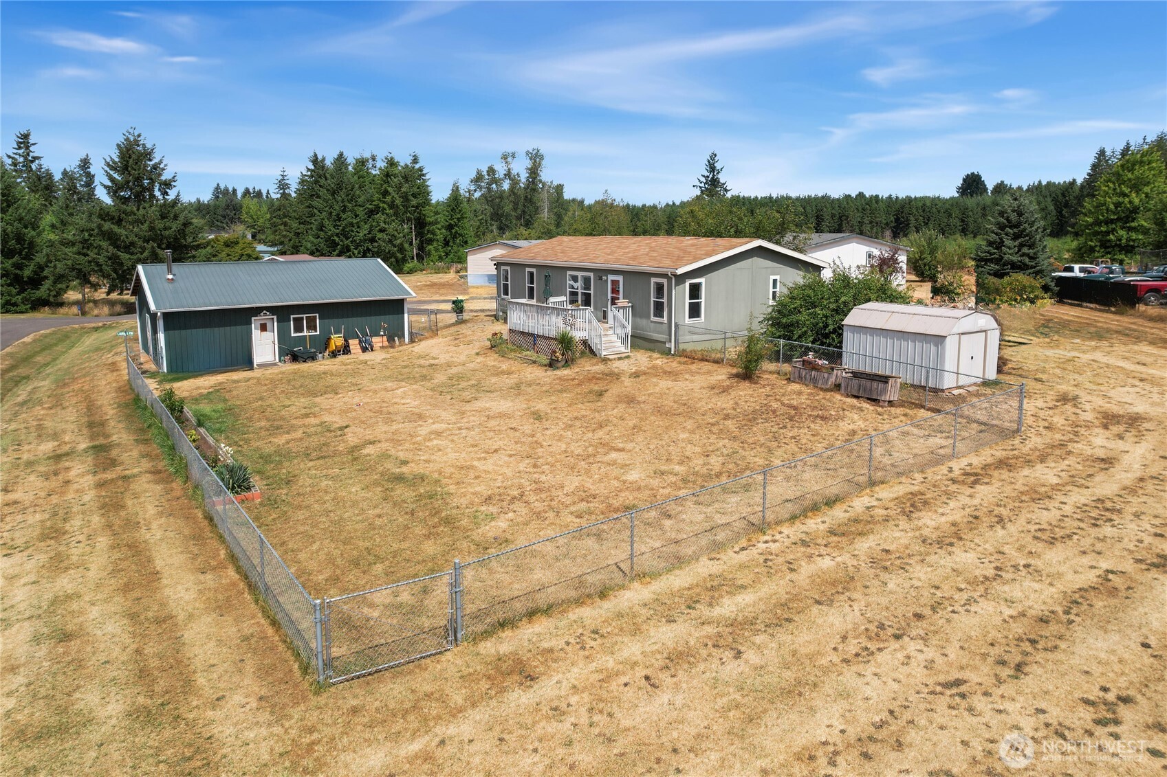270 Romerman Road, Unit 34 Chehalis, WA 98532 - Photo 27 of 34 a aerial view of a house with a yard