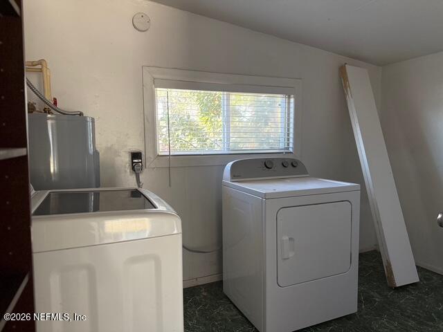 310 Noel Road Orange Park, FL 32073 - Photo 11 of 14 a utility room with dryer and washer