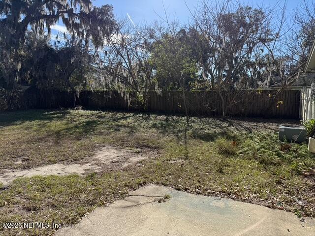 310 Noel Road Orange Park, FL 32073 - Photo 12 of 14 a backyard of a house with lots of green space