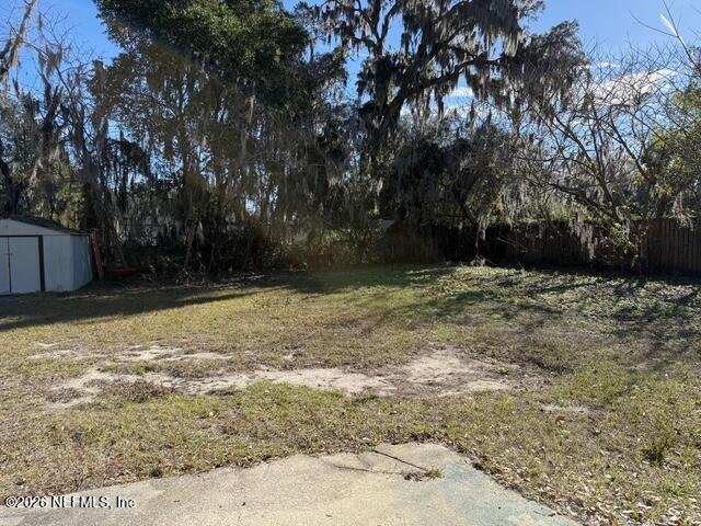 310 Noel Road Orange Park, FL 32073 - Photo 14 of 14 a view of a yard with a tree