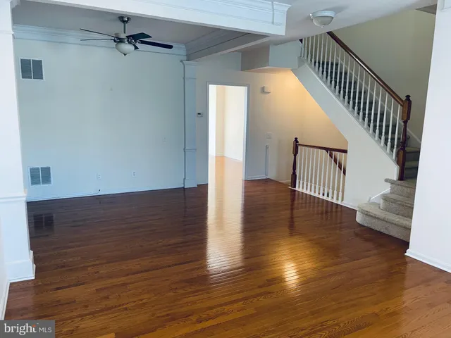 a view of a hallway with windows