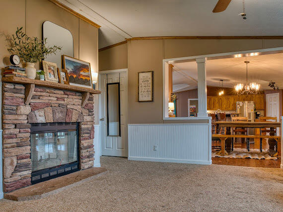 6341 Farm Private Road Levelland, TX 79336 - Photo 14 of 46 a view of a livingroom with furniture and a fireplace
