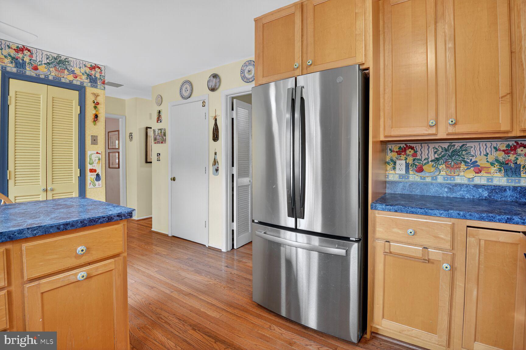 109 Aberdeen Road Rockville, MD 20850 - Photo 11 of 30 a kitchen with stainless steel appliances granite countertop a refrigerator and a stove