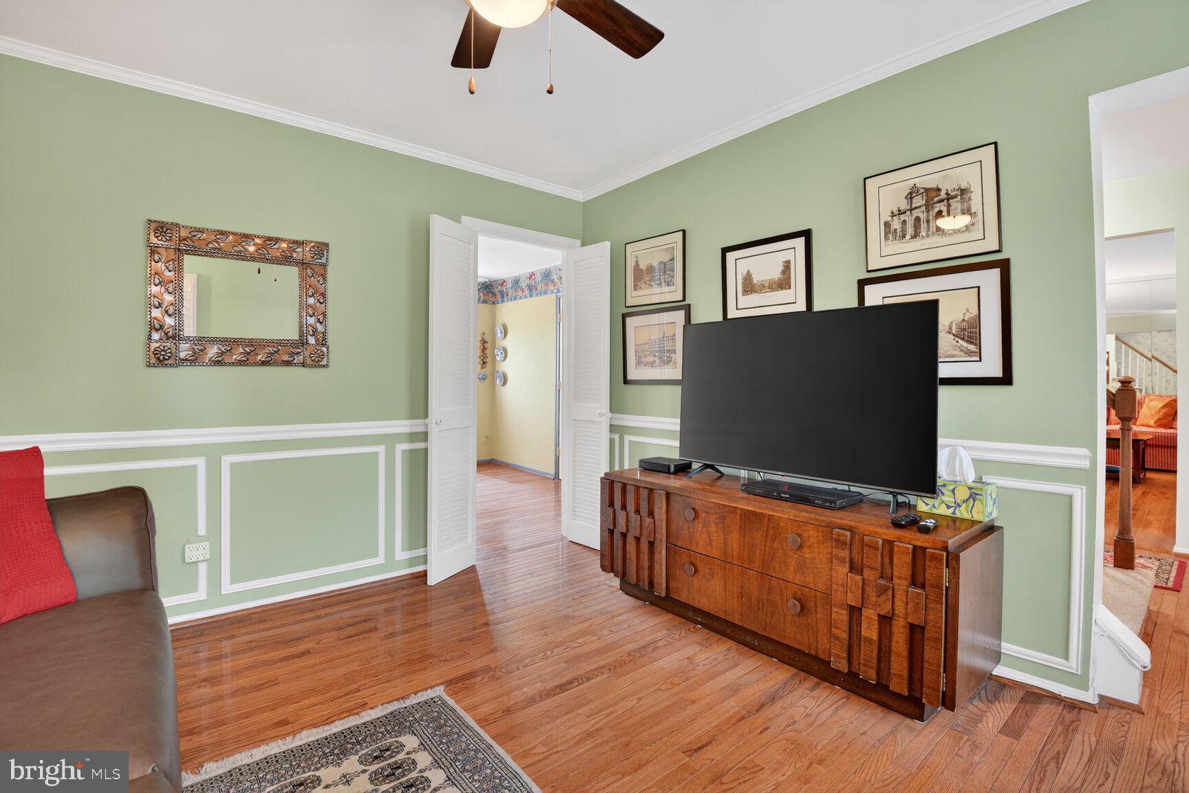 109 Aberdeen Road Rockville, MD 20850 - Photo 16 of 30 a living room with furniture and a flat screen tv