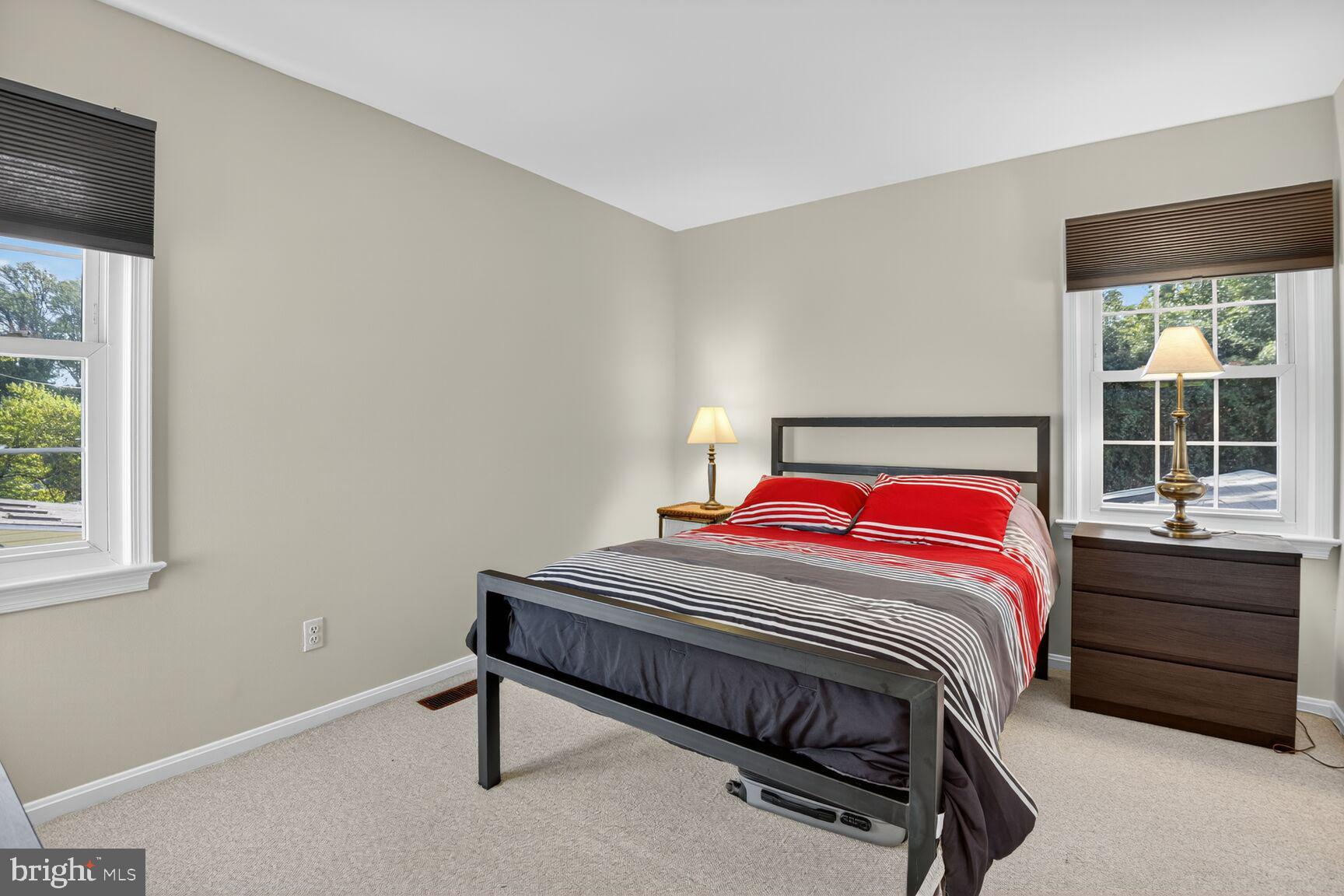 109 Aberdeen Road Rockville, MD 20850 - Photo 21 of 30 a bedroom with a bed and a window