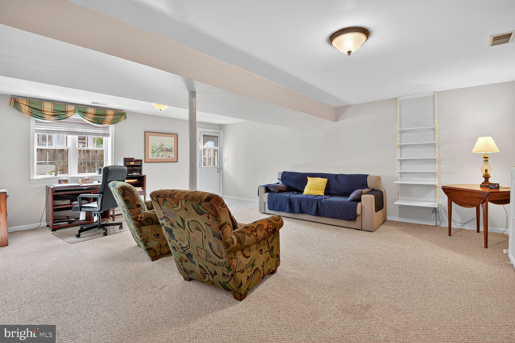 109 Aberdeen Road Rockville, MD 20850 - Photo 23 of 30 a bed room with couch and a window
