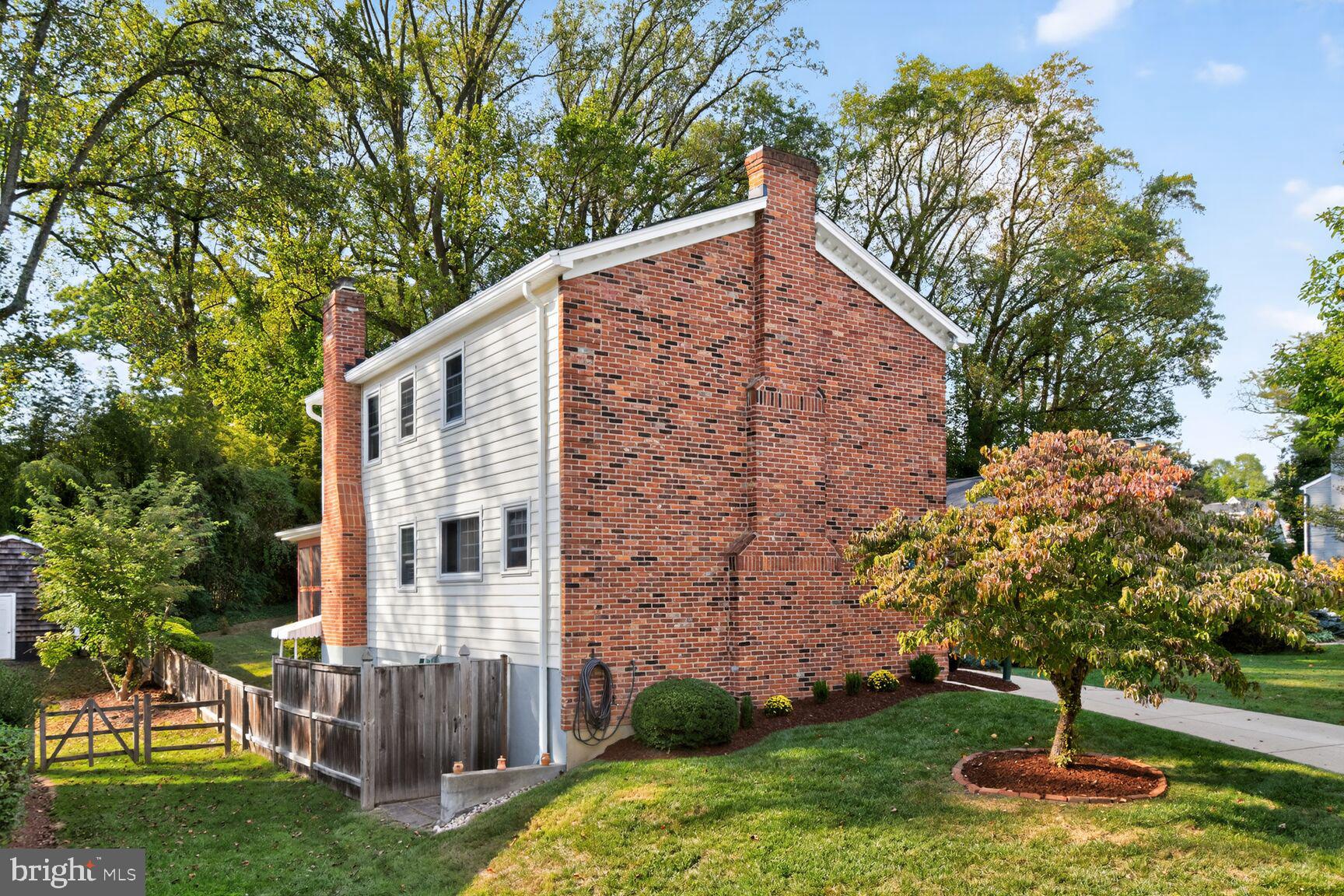 109 Aberdeen Road Rockville, MD 20850 - Photo 27 of 30 a backyard of a house with plants and large tree