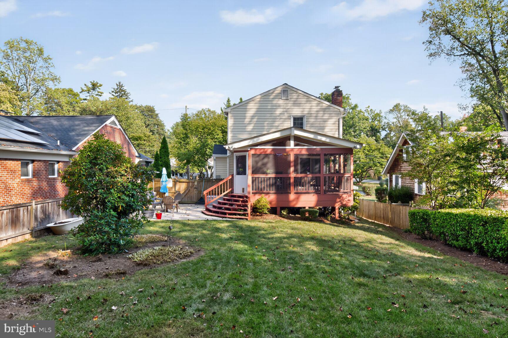 109 Aberdeen Road Rockville, MD 20850 - Photo 29 of 30 a view of a big house with a big yard and potted plants