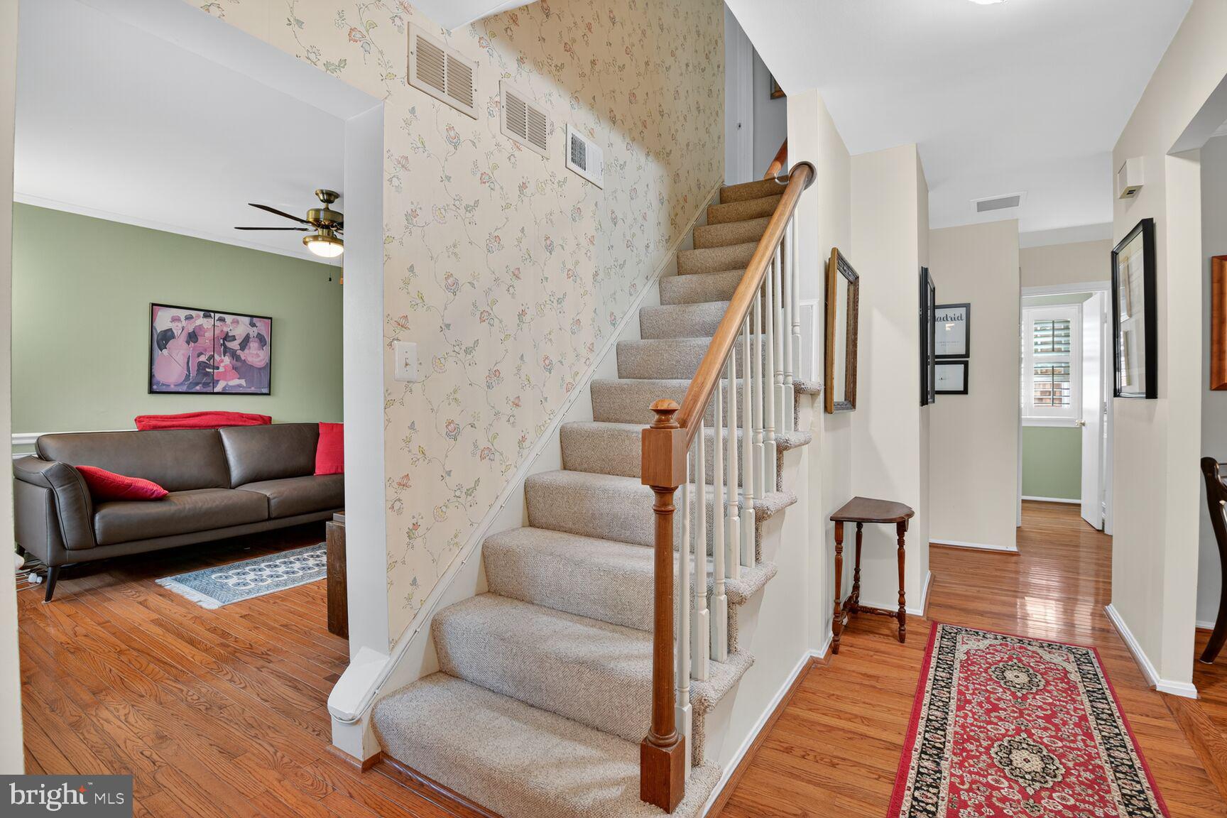 109 Aberdeen Road Rockville, MD 20850 - Photo 3 of 30 a living room with furniture and a rug