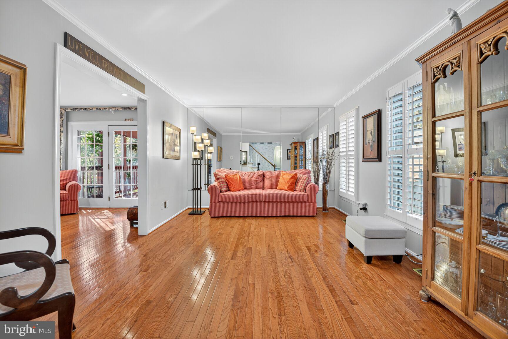 109 Aberdeen Road Rockville, MD 20850 - Photo 4 of 30 a living room with furniture and a wooden floor