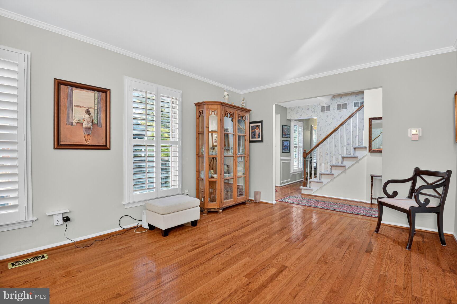109 Aberdeen Road Rockville, MD 20850 - Photo 5 of 30 a living room with furniture and a wooden floor