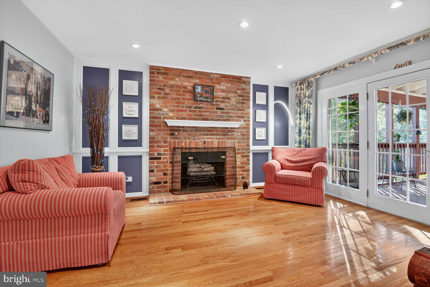 109 Aberdeen Road Rockville, MD 20850 - Photo 7 of 30 a living room with furniture and a fireplace