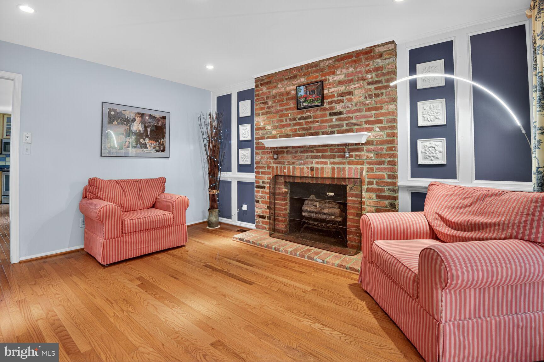 109 Aberdeen Road Rockville, MD 20850 - Photo 8 of 30 a living room with furniture and a fireplace