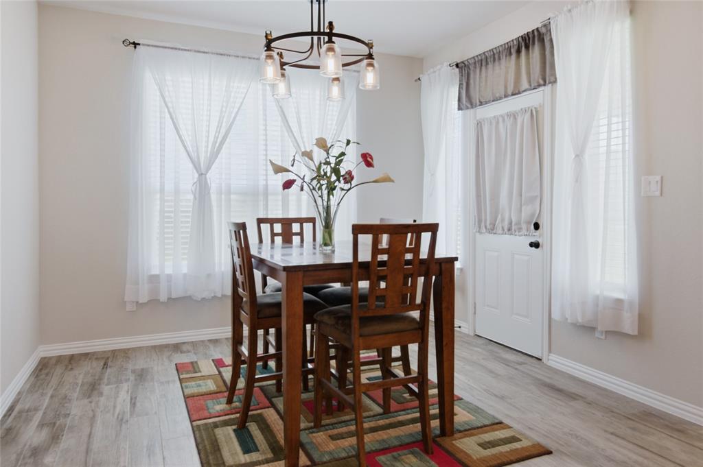 6343 Rustic Edge Street Godley, TX 76044 - Photo 16 of 37 12 x 15 dining area larger enough to accommodate a large table