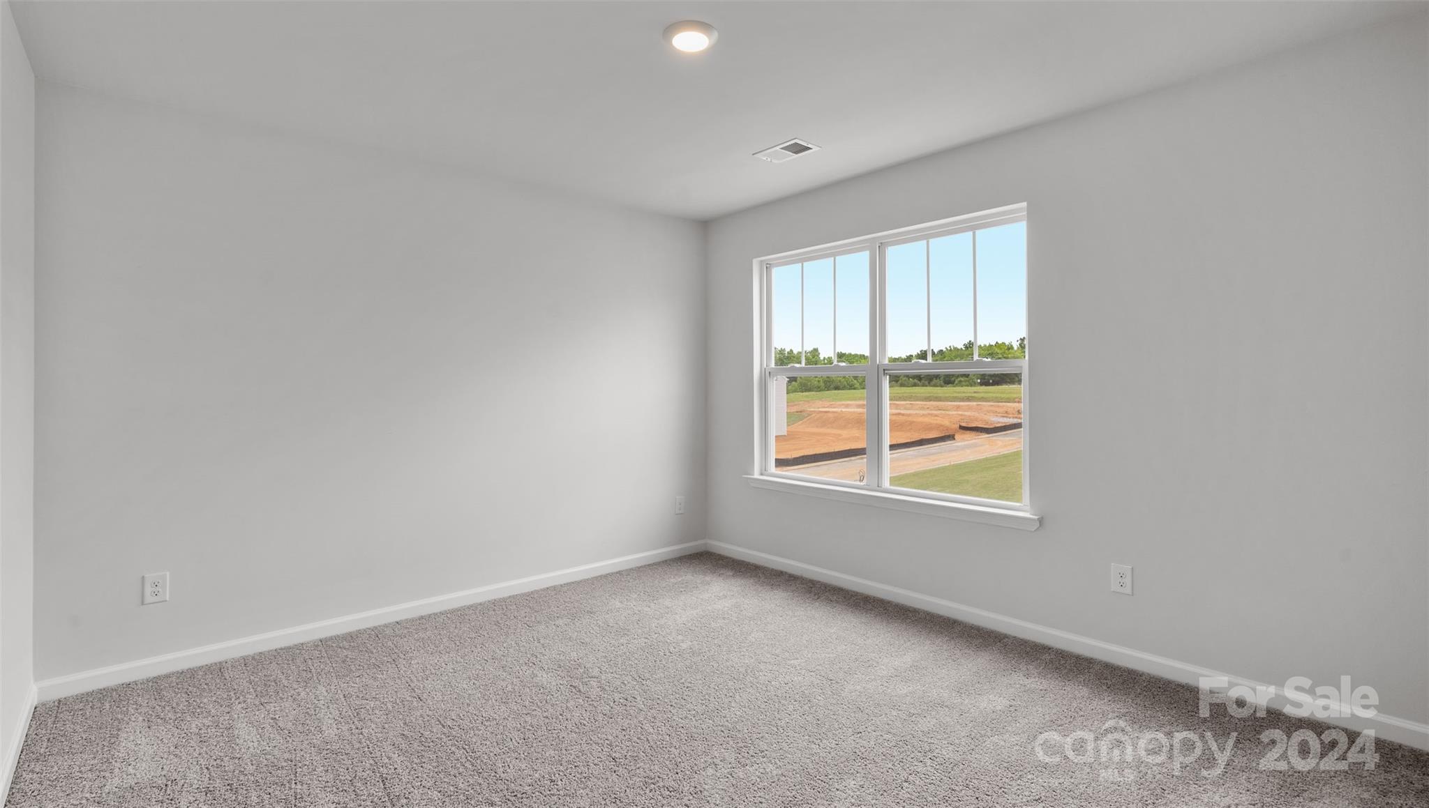 61 Callie River Clyde, NC 28721 - Photo 13 of 23 an empty room with a window