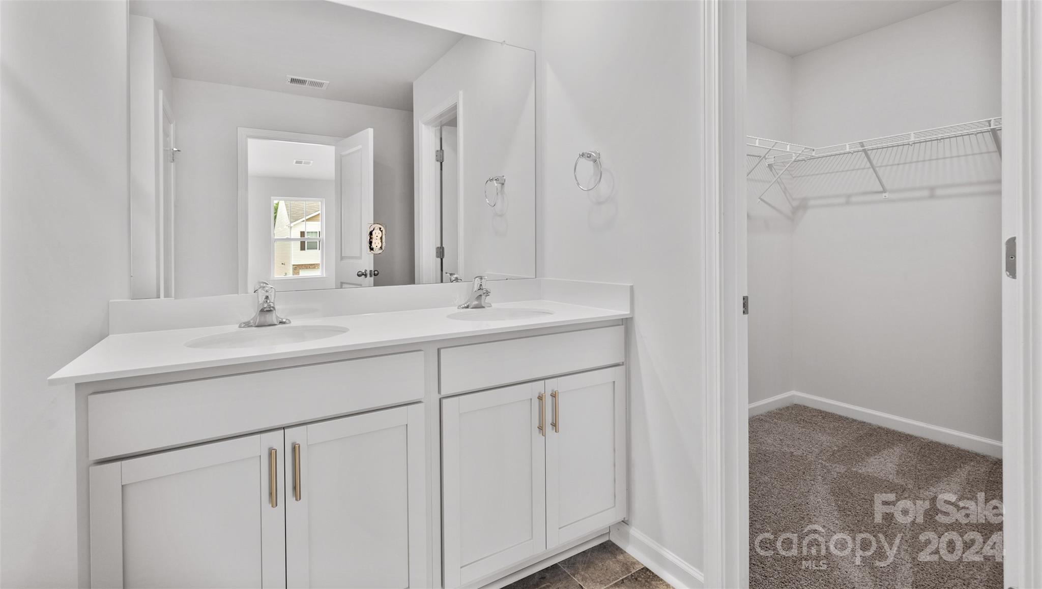 61 Callie River Clyde, NC 28721 - Photo 17 of 23 a bathroom with a sink and a mirror