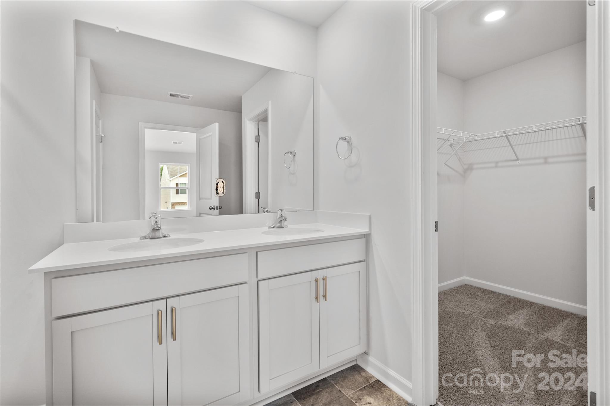 61 Callie River Clyde, NC 28721 - Photo 21 of 23 a bathroom with a sink and a mirror