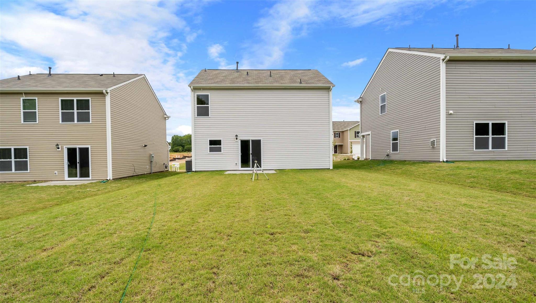 61 Callie River Clyde, NC 28721 - Photo 22 of 23 a view of a house with backyard and garage