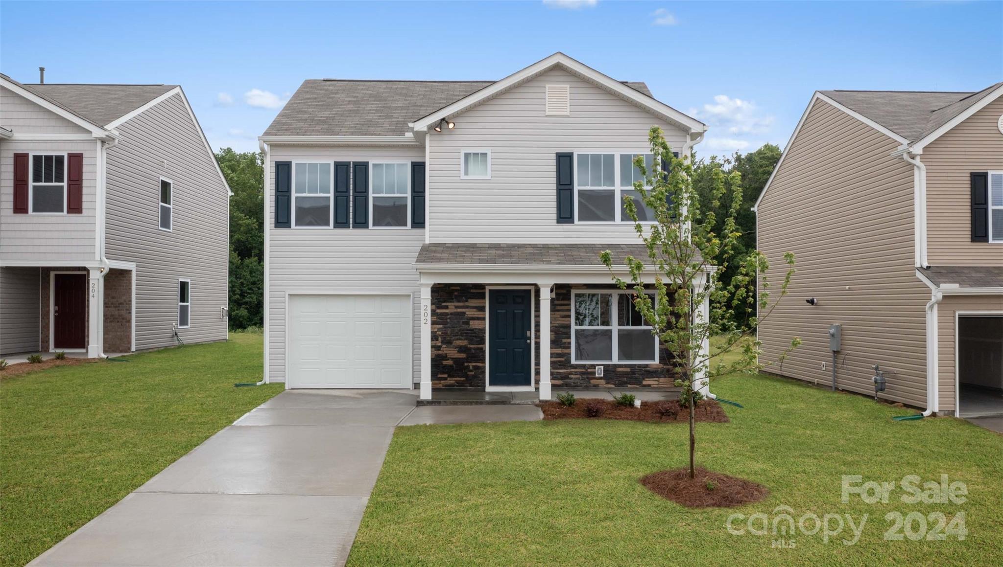 61 Callie River Clyde, NC 28721 - Photo 3 of 23 a front view of house with yard