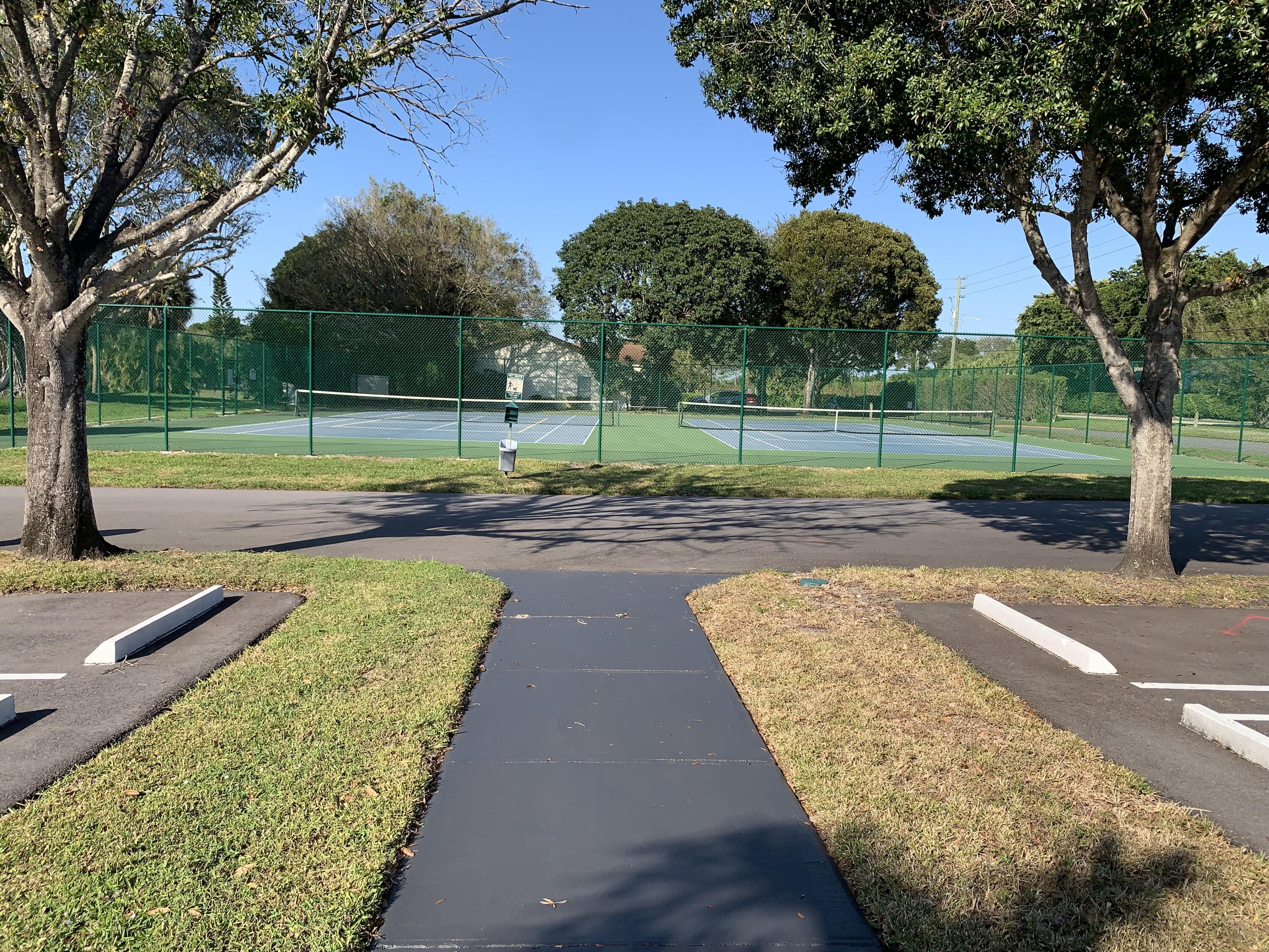 2500 Fiore Way, Unit 109 Delray Beach, FL 33445 - Photo 12 of 14 TENNIS COURTS