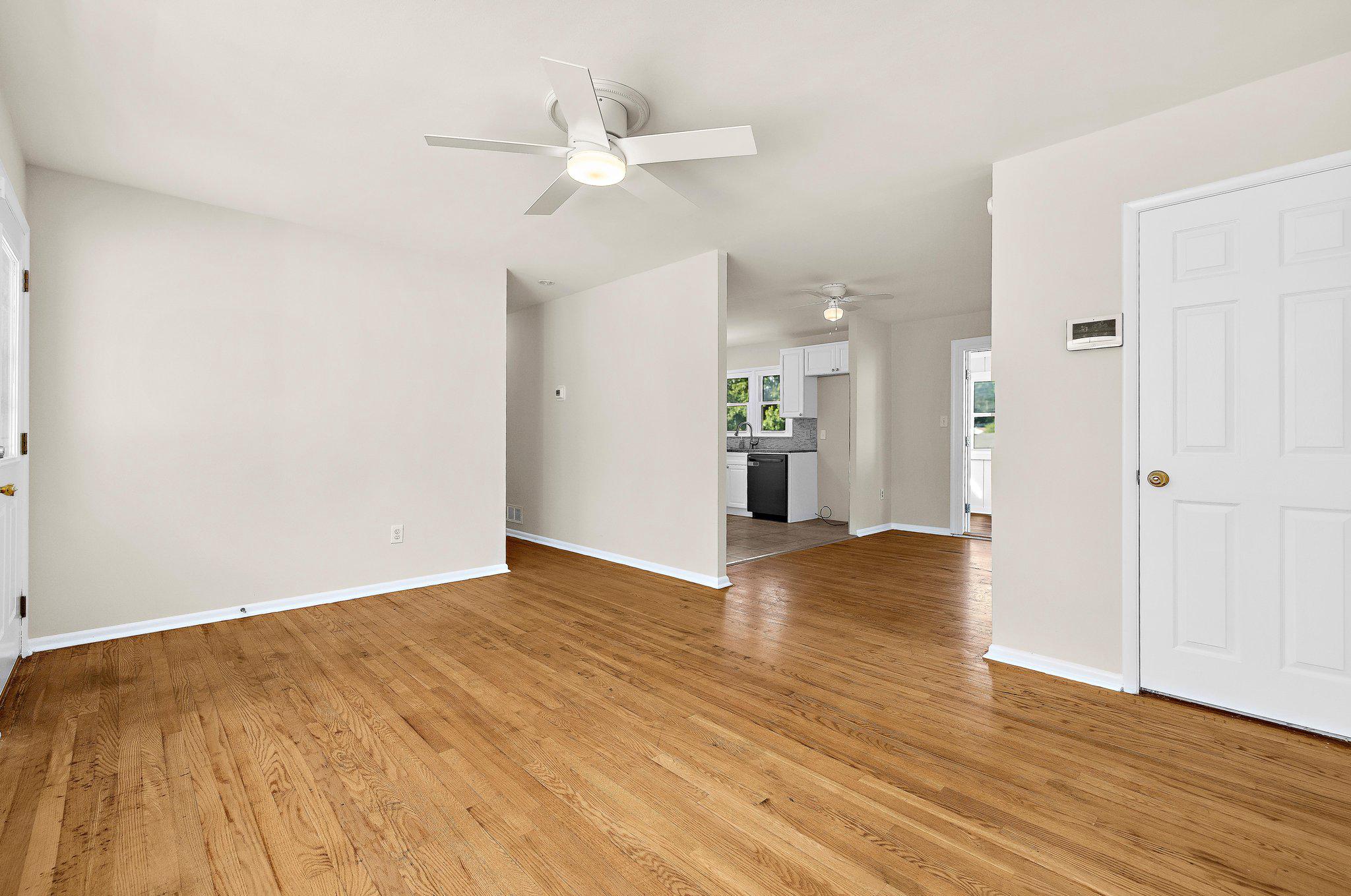 5822 Forest Hill Road Elkridge, MD 21075 - Photo 8 of 55 Bright, open main living area with hardwood floors