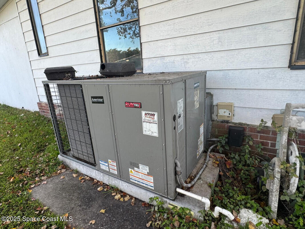 1973 Mango Street Northeast Palm Bay, FL 32905 - Photo 4 of 14 a close up of a storage