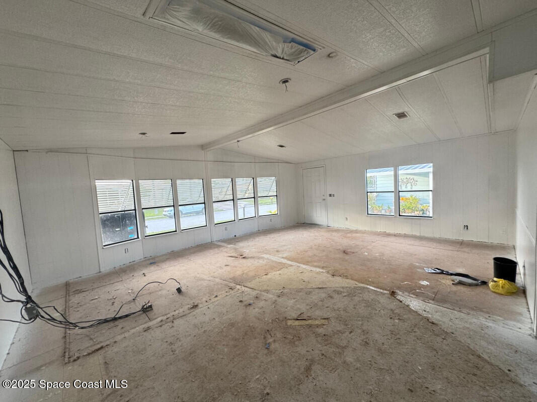 1973 Mango Street Northeast Palm Bay, FL 32905 - Photo 7 of 14 a view of an empty room with a window