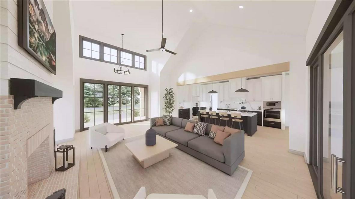 204 Rogers Road Pendleton, SC 29670 - Photo 5 of 12 Bright and airy living spaces blend seamlessly with a modern kitchen, creating an inviting atmosphere.