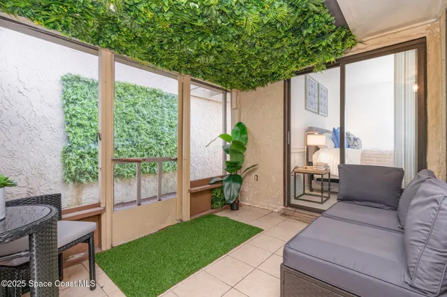 a garden view with a seating space