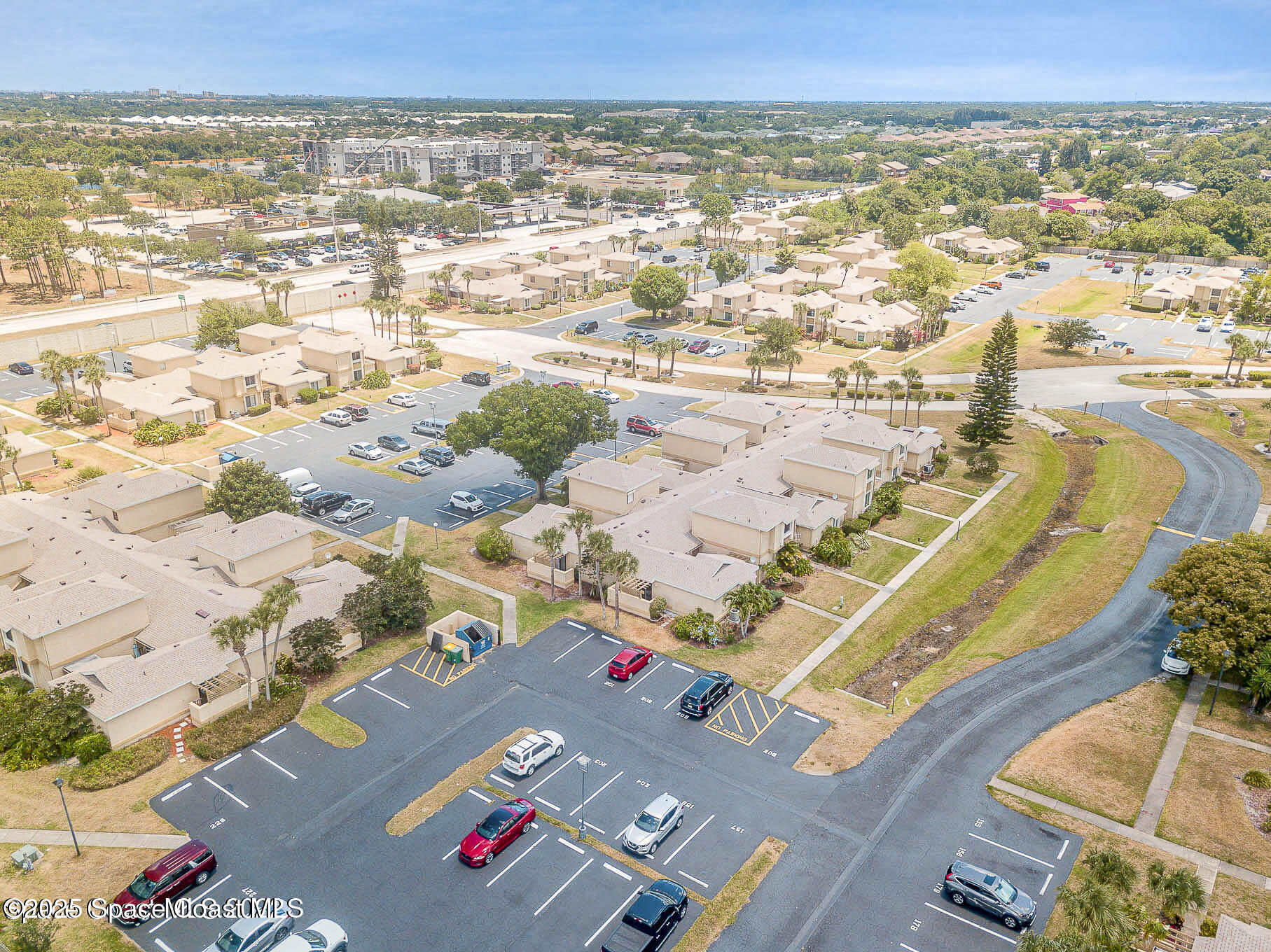 1411 Sheafe Avenue Northeast, Unit 101 Palm Bay, FL 32905 - Photo 22 of 25 view of city and ocean
