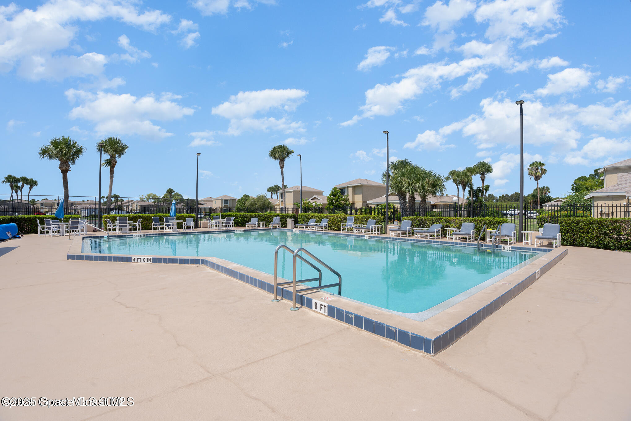 1411 Sheafe Avenue Northeast, Unit 101 Palm Bay, FL 32905 - Photo 25 of 25 a view of a lake with a terrace