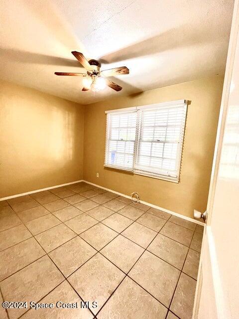 58 Shady Lane Rockledge, FL 32955 - Photo 11 of 12 a view of an empty room and window