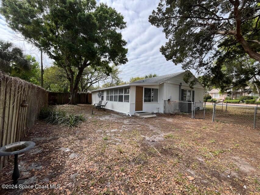 58 Shady Lane Rockledge, FL 32955 - Photo 12 of 12 a front view of a house with garden