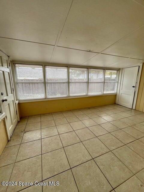 58 Shady Lane Rockledge, FL 32955 - Photo 6 of 12 a view of a livingroom with an empty space and window