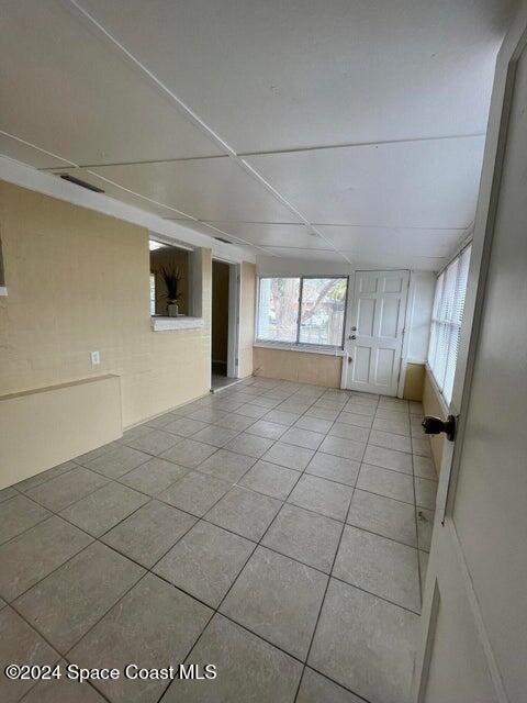 58 Shady Lane Rockledge, FL 32955 - Photo 7 of 12 a view of an empty room with a window