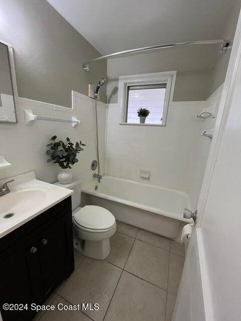 58 Shady Lane Rockledge, FL 32955 - Photo 9 of 12 a bathroom with a sink a toilet and shower