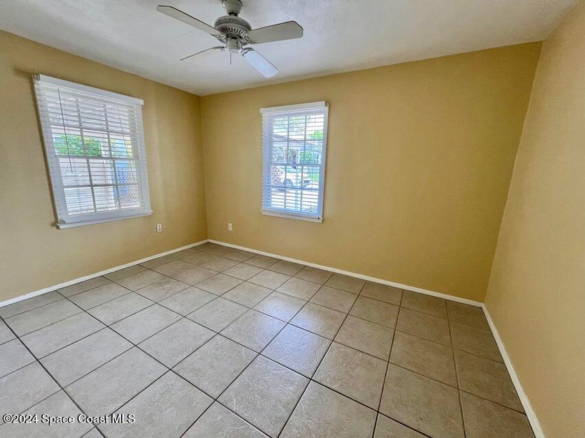 58 Shady Lane Rockledge, FL 32955 - Photo 10 of 12 a view of an empty room with a window