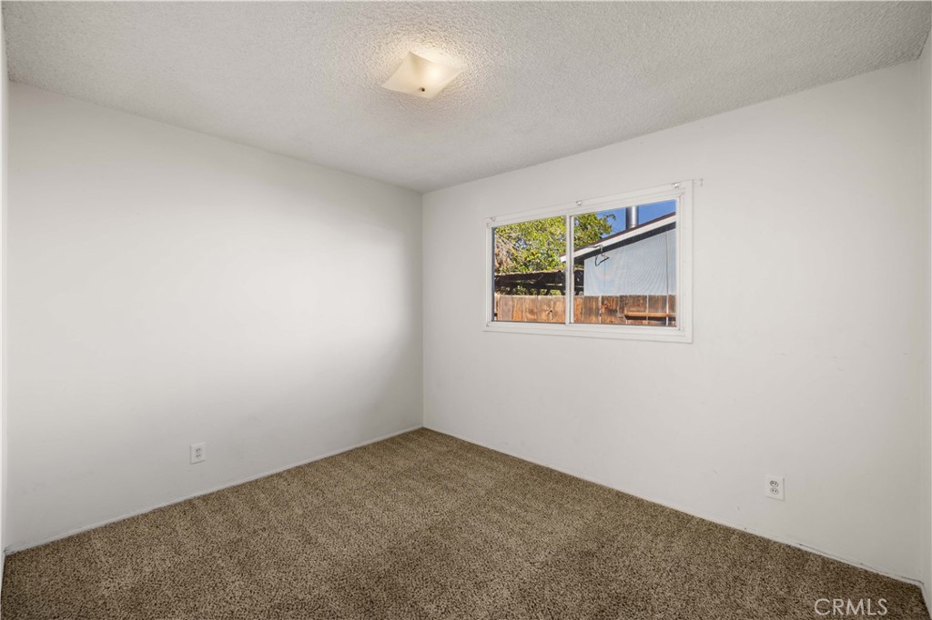 45443 Saigon Avenue Lancaster, CA 93534 - Photo 14 of 20 an empty room with windows