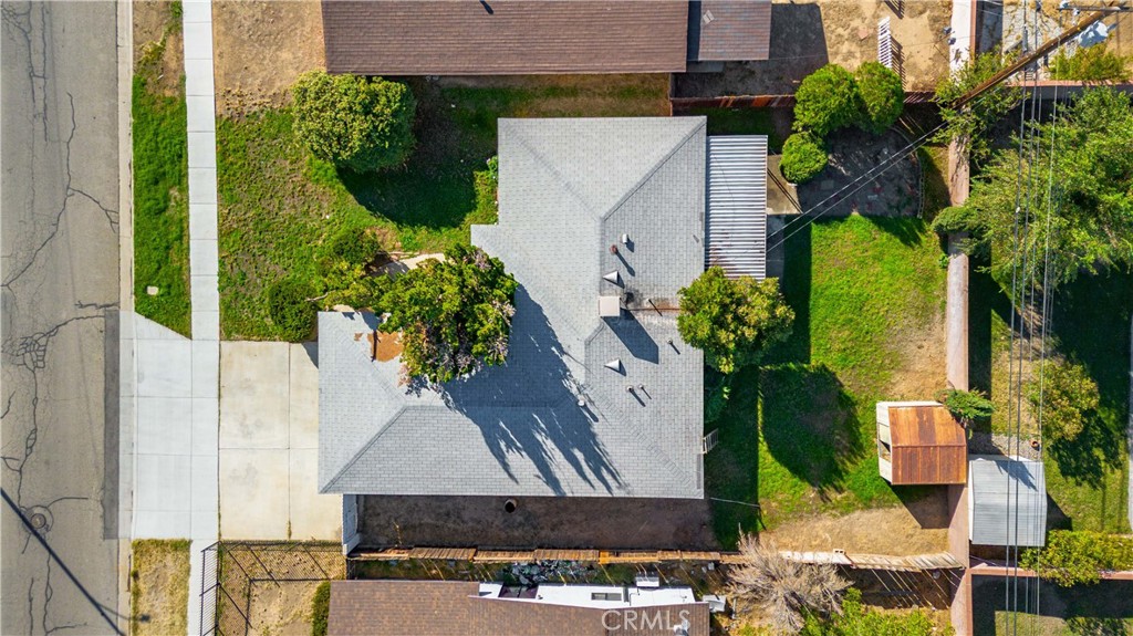 45443 Saigon Avenue Lancaster, CA 93534 - Photo 20 of 20 an aerial view of a house with a yard and potted plants