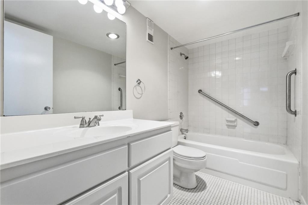 5600 Munhall Road, Unit 202 Pittsburgh, PA 15217 - Photo 18 of 24 a bathroom with a sink a toilet and a bathtub