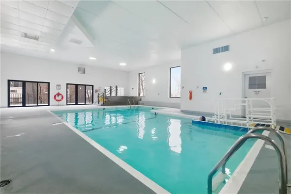 a view of a living room and dining room