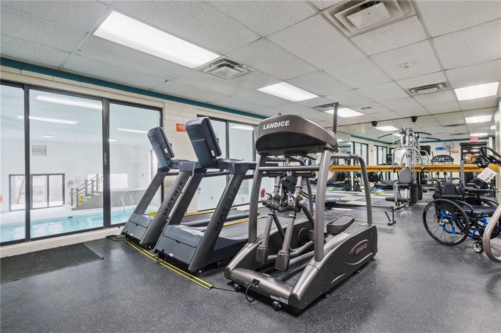 5600 Munhall Road, Unit 202 Pittsburgh, PA 15217 - Photo 22 of 24 a view of a room with gym equipment