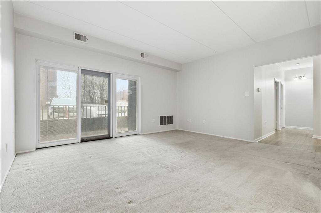 5600 Munhall Road, Unit 202 Pittsburgh, PA 15217 - Photo 5 of 24 an empty room with windows