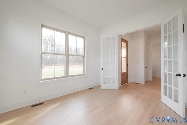 an empty room with windows