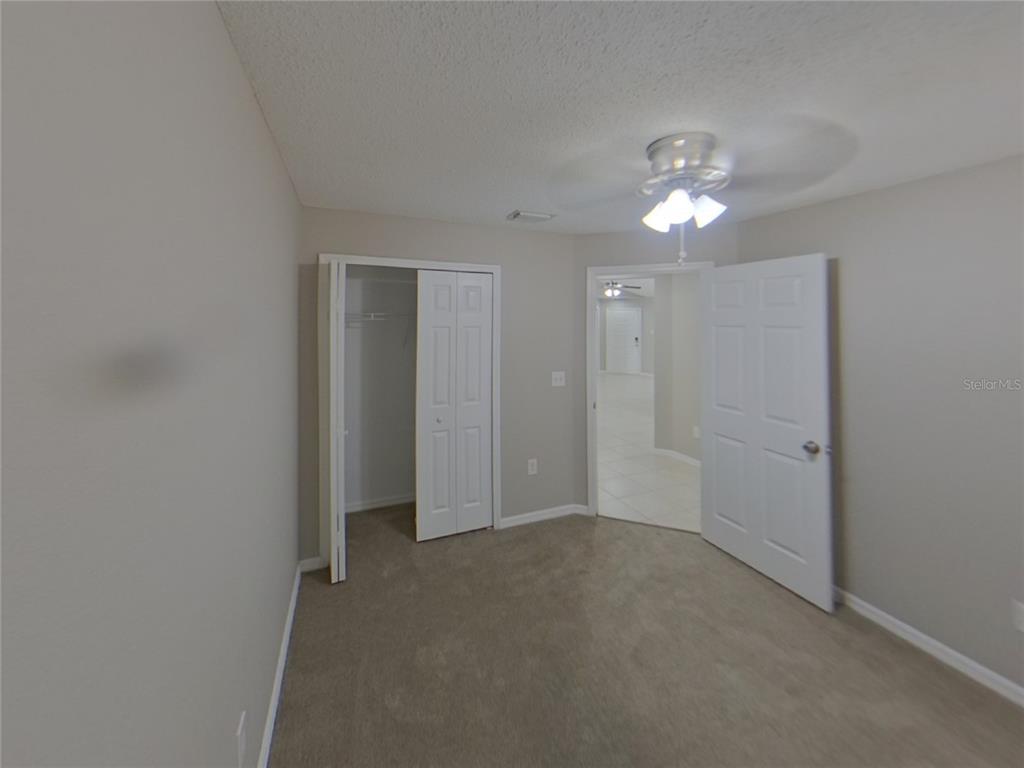 Undisclosed Address Riverview, FL 33578 - Photo 11 of 15 a view of an empty room